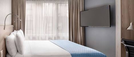 Room, 1 King Bed, Non Smoking | In-room safe, desk, laptop workspace, iron/ironing board