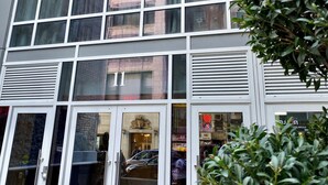A building with a sign reading "WINGATE BY WINPHAM".