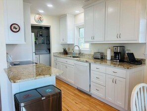 Fridge, microwave, oven, stovetop - Experience oceanfront bliss at Serenity Now in Holden Beach, NC – perfect for 6! (Holden Beach)