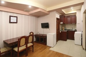 Fridge, microwave, stovetop, coffee/tea maker