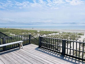 Property grounds - Seaside: Spacious 4BR oceanfront home in Holden Beach, perfect for 12 guests. (Holden Beach)
