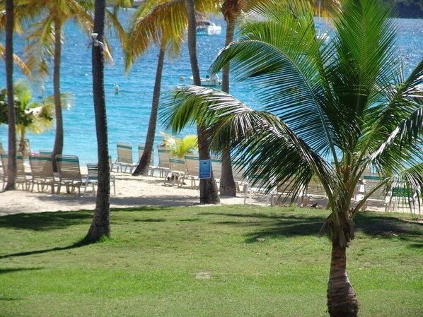 On the beach, sun-loungers, beach towels
