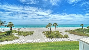 On the beach, sun-loungers, beach towels