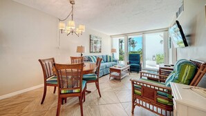 Living area - LaPlaya 101E-Relax on your private lanai under the palms! (Longboat Key)
