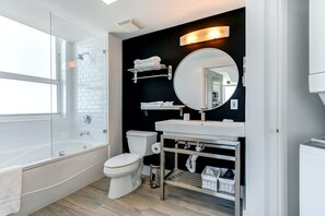 Combined shower/bathtub, hair dryer, towels, soap