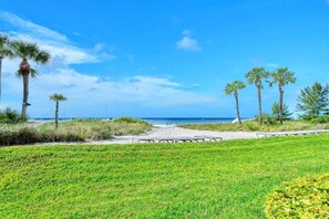 On the beach, sun-loungers, beach towels - LaPlaya 109A-Enjoy the balmy breezes in this corner end unit right on the beach. (Longboat Key)