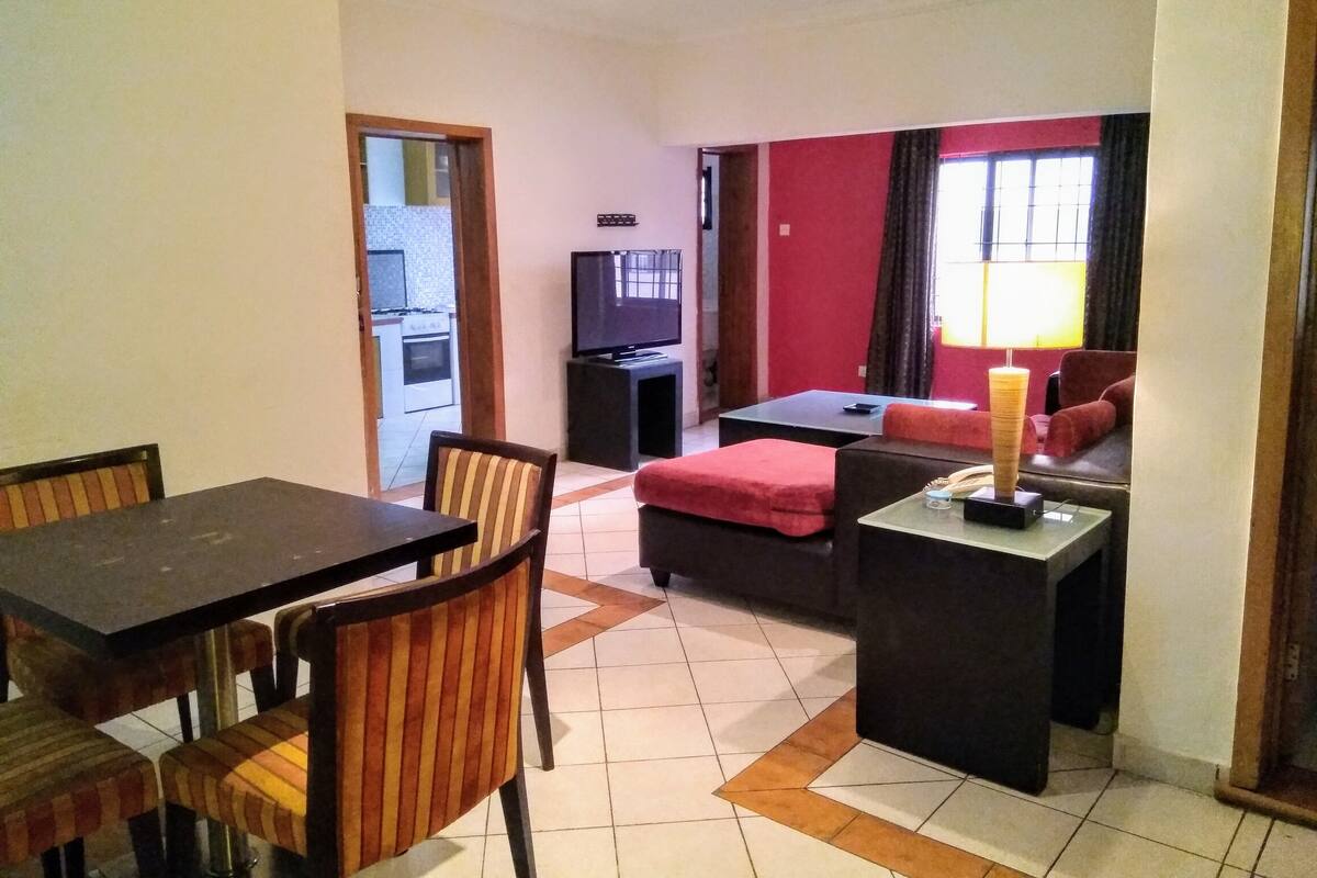Apartment, 2 Double Beds | Living area | 42-inch flat-screen TV with cable channels, TV
