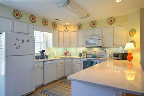 Fridge, microwave, oven, stovetop - Charming oceanfront retreat, Sea Shanty / 153 Marlin, with 3 beds in Holden Beach. (Holden Beach)