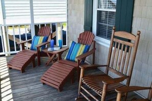 Terrace/patio - Experience bliss at Coast 'N Along, a spacious 3-bedroom retreat in Holden Beach. (Holden Beach)