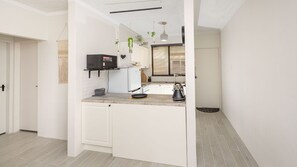 Fridge, microwave, oven, stovetop - Bay Village Unit 2/47 Shoal Bay Rd - Stylishly furnished unit with views over Shoal Bay Beach (Shoal Bay)