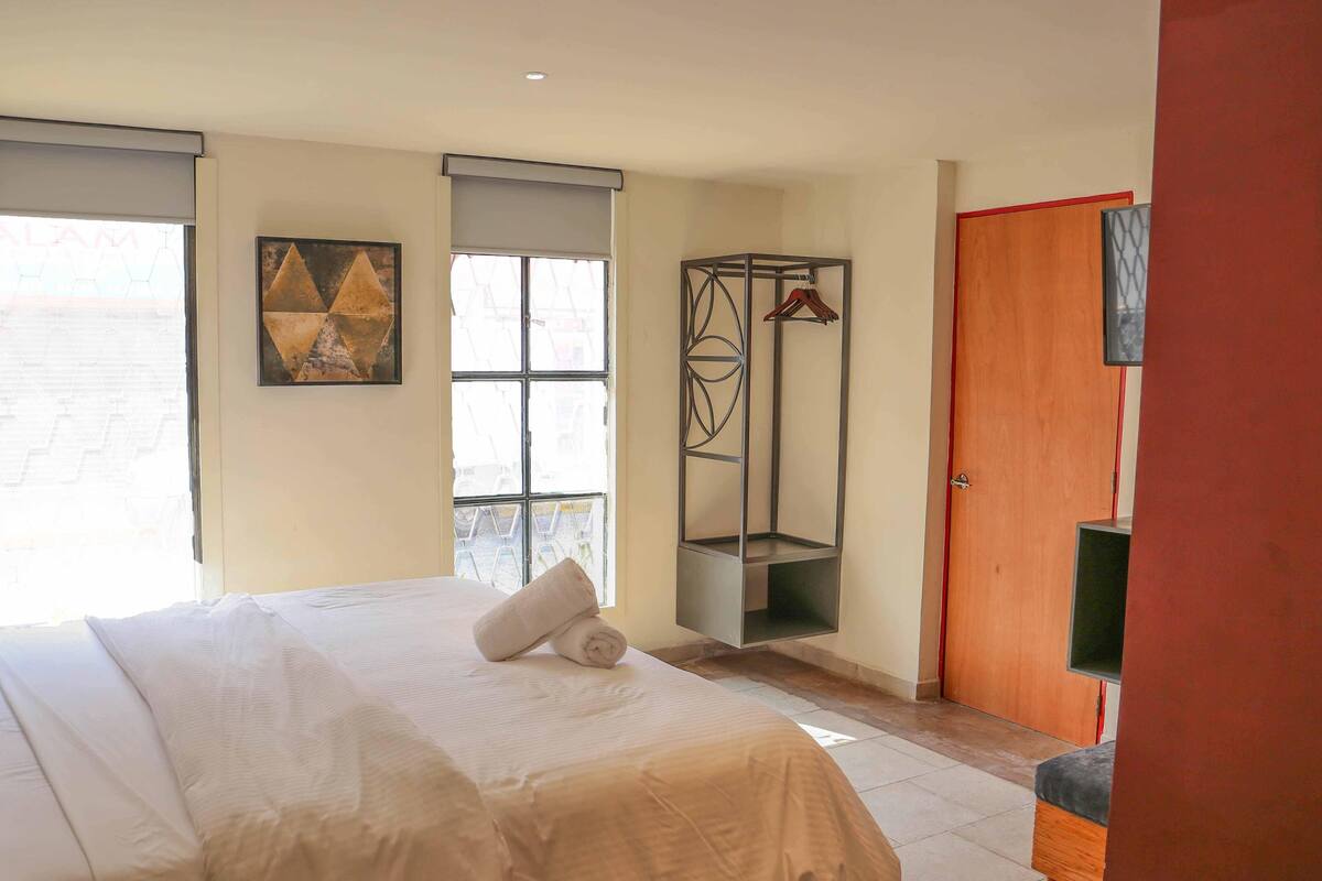 Desk, blackout drapes, iron/ironing board, WiFi (free)