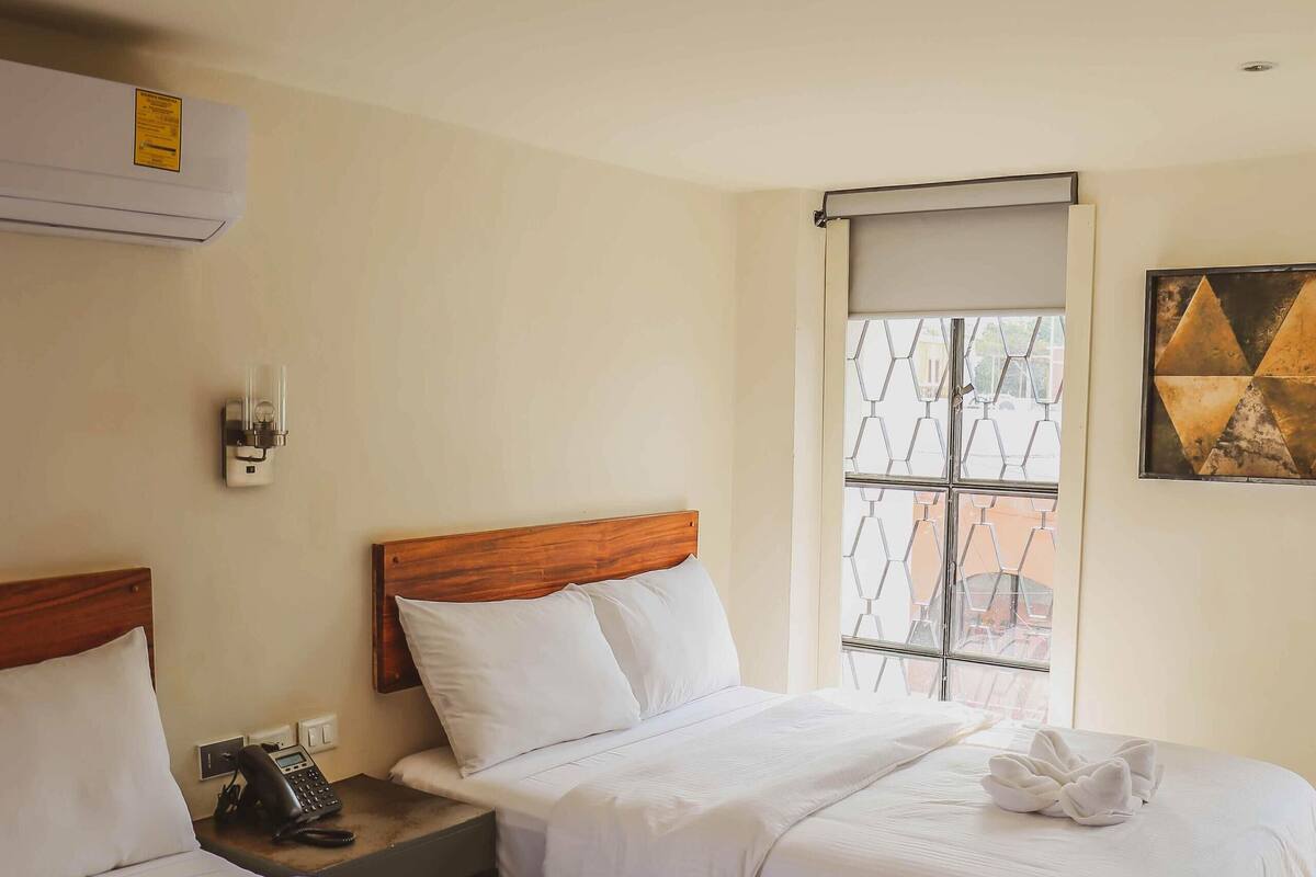 Desk, blackout drapes, iron/ironing board, WiFi (free)