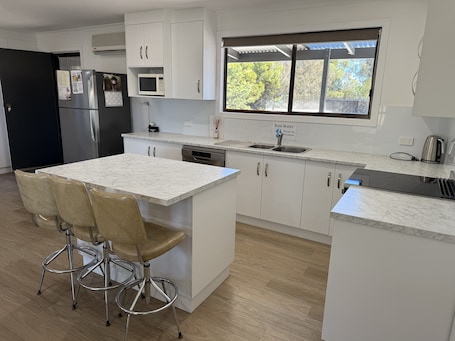 Fridge, microwave, oven, stovetop. Carron Cottage - close to beach opposite general store. Off Peak Special!