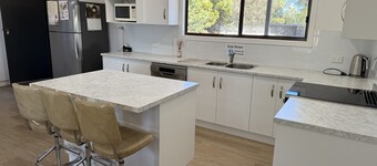 Carron Cottage  -  close to beach opposite general store.  Off Peak Special!