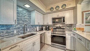 Coffee/tea maker, fridge, microwave, oven