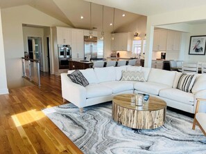 TV - Experience serenity at The Rainbow Connection, a spacious 4-bedroom home near Holden Beach. (Holden Beach)