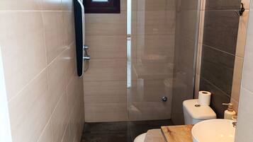 Shower, towels, soap, shampoo