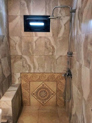 Shower, towels, soap, shampoo