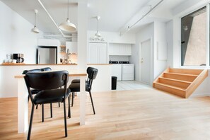 Apartment, 2 Bedrooms, Patio (SR301) | Living area | 42-inch flat-screen TV with cable channels, Smart TV - Les Lofts St-Roch by Les Lofts Vieux-Quebec (Québec City)