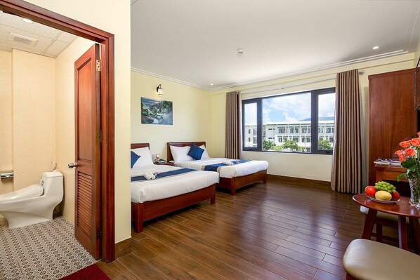 Deluxe Quadruple Room | Minibar, desk, blackout drapes, free WiFi - Ga Vang Hotel (Da Nang)
