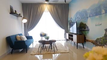 Departamento, 2 habitaciones, para no fumadores | Área de sala de estar | Televisión de pantalla plana