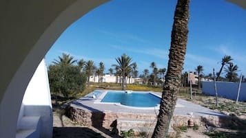 Outdoor pool, pool umbrellas, pool loungers