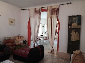 Villa | Living area | 75-inch plasma TV with digital channels, TV, fireplace - Houch La Driba (Djerba Midun)