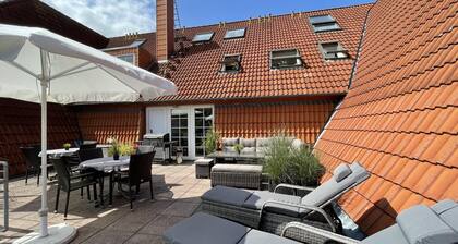 Huoneisto nro 6 talossa Parkpension vain muutaman askeleen päässä rannasta
