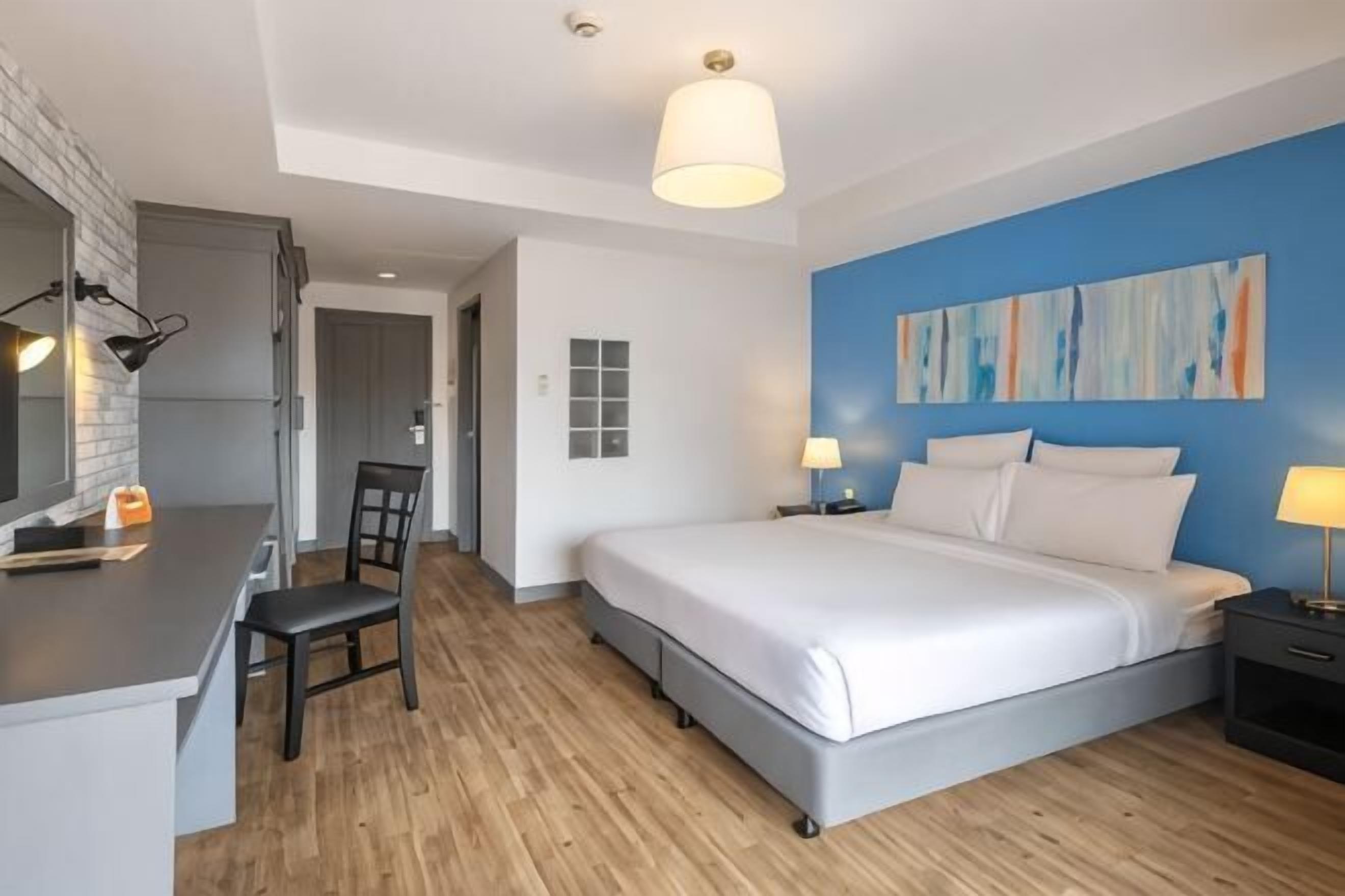 Premium bedding, in-room safe, individually decorated, desk