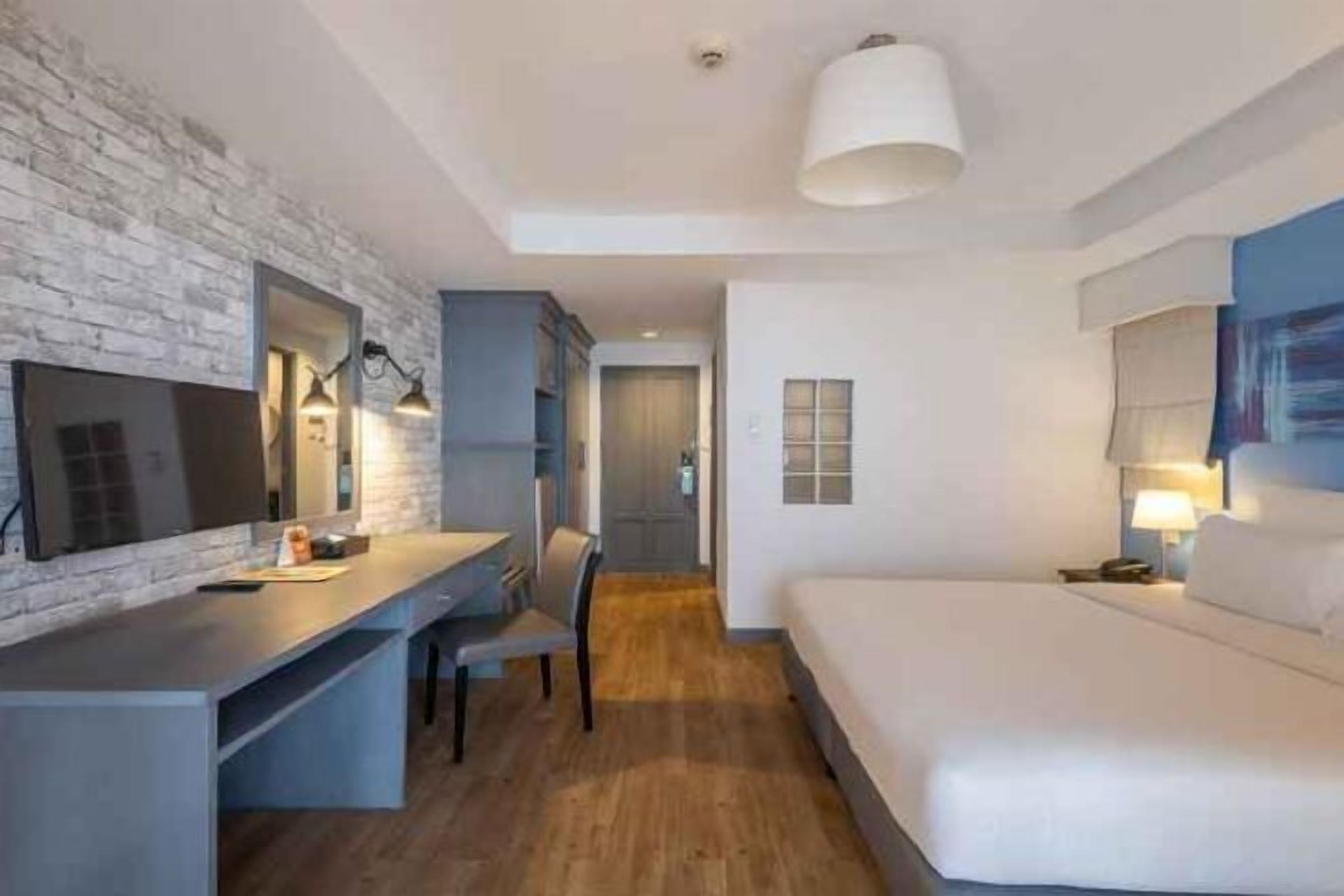 Premium bedding, in-room safe, individually decorated, desk