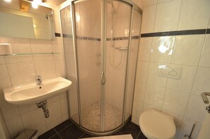 Bathtub, hair dryer, towels