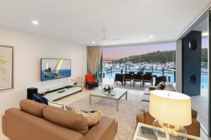 Apartment, 4 Bedrooms | Living area | Flat-screen TV, DVD player - Pavillion 3 Absolute Waterfront (Whitsundays)