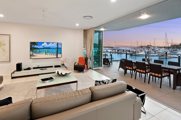 Apartment, 4 Bedrooms | Living area | Flat-screen TV, DVD player