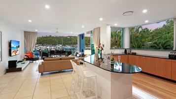 Apartment, 4 Bedrooms | Living area | Flat-screen TV, DVD player