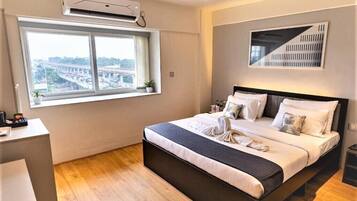 Individually furnished, desk, laptop workspace, blackout drapes