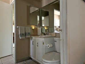 Shower, towels, soap, toilet paper