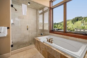 Combined shower/tub, jetted tub, hair dryer, towels - River View Villa, AC! Luxury Downtown Condo with 2 Large Decks with Views, 2 Garage Parking Spots! (Steamboat Springs)
