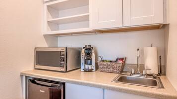 Fridge, microwave, coffee/tea maker, toaster