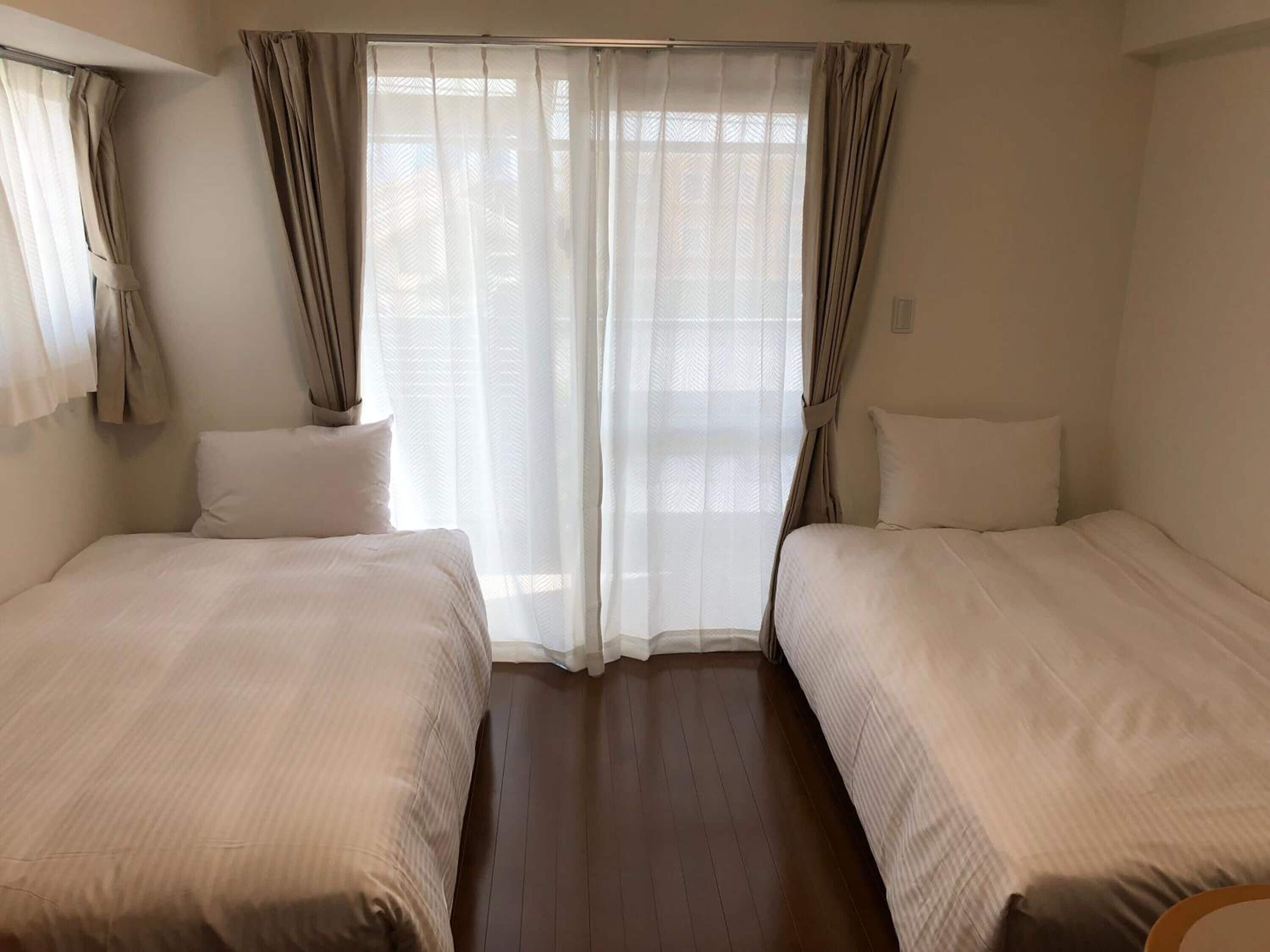 Desk, laptop workspace, blackout drapes, free WiFi