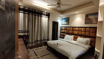 Minibar, desk, soundproofing, rollaway beds