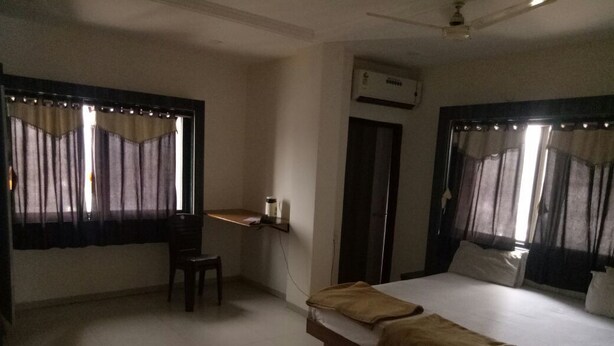 Deluxe Double or Twin Room, 1 Large Twin Bed, Smoking, City View | 1 bedroom, Egyptian cotton sheets, premium bedding, memory foam beds - JK Rooms 133 Hotel Prime Inn (Ankleshwar)