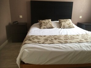 Habitación doble superior | Cunas y ropa de cama