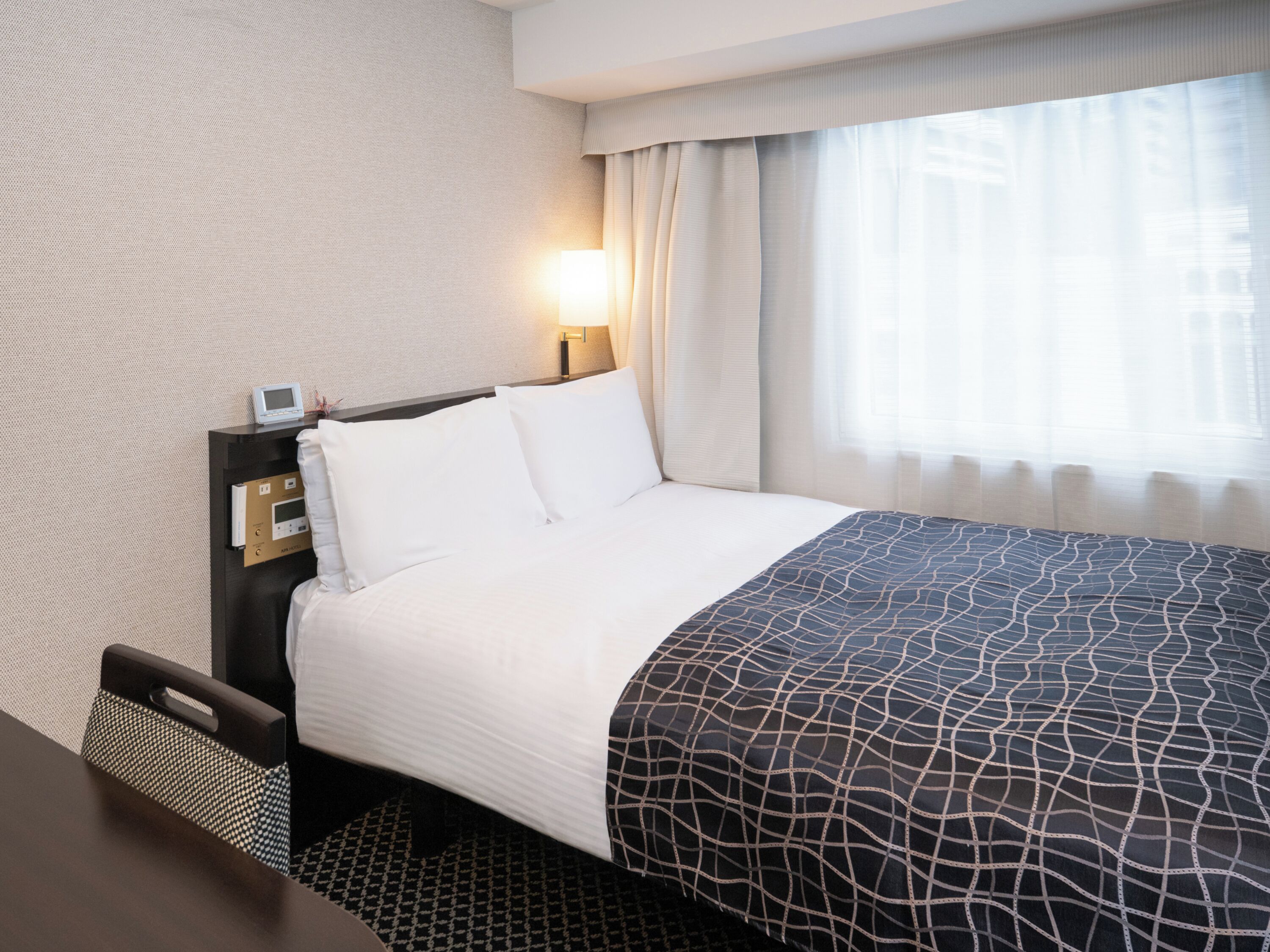 Down duvets, desk, laptop workspace, blackout curtains