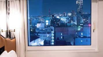 Down duvets, desk, laptop workspace, blackout curtains