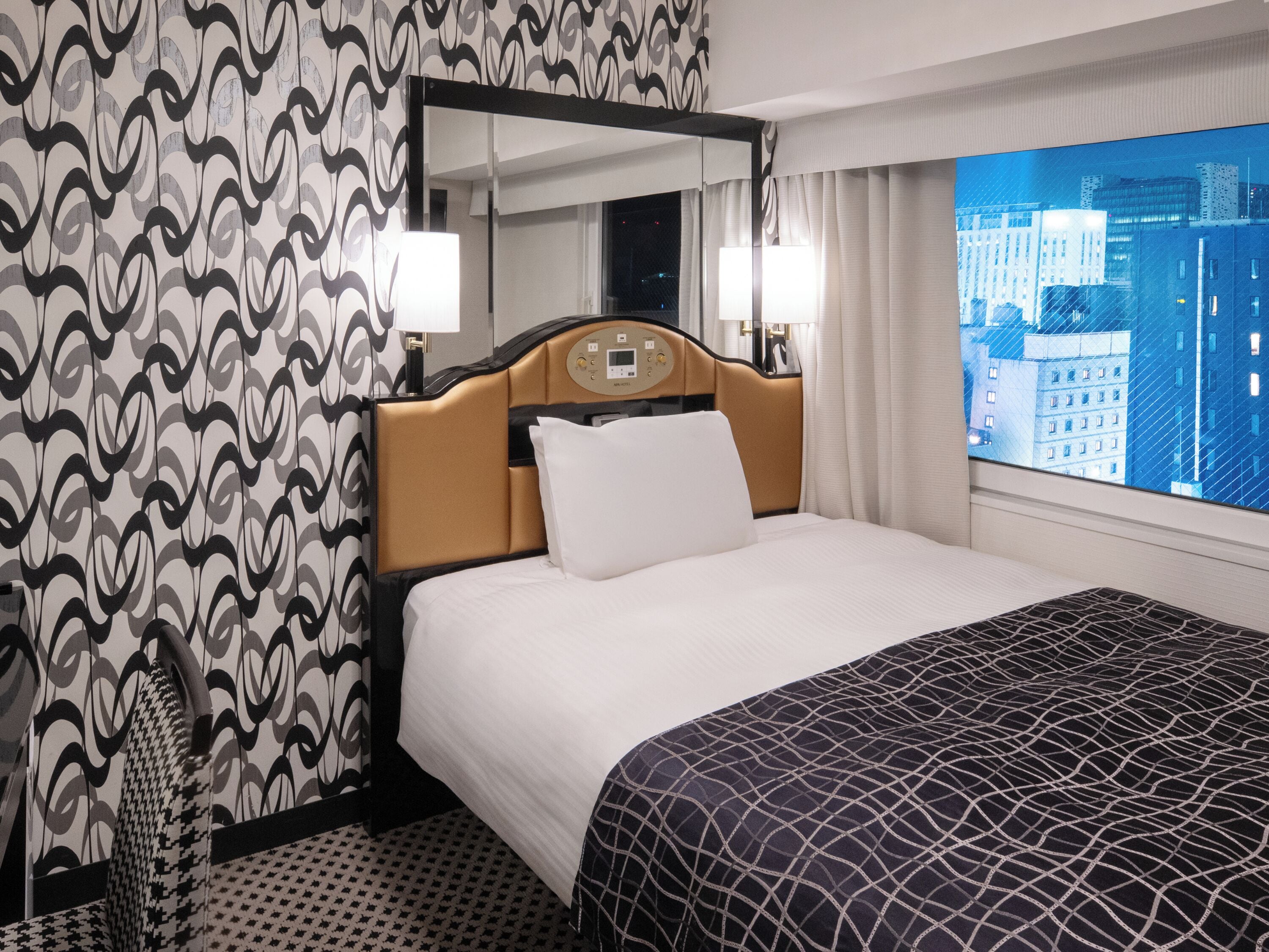 Down duvets, desk, laptop workspace, blackout curtains