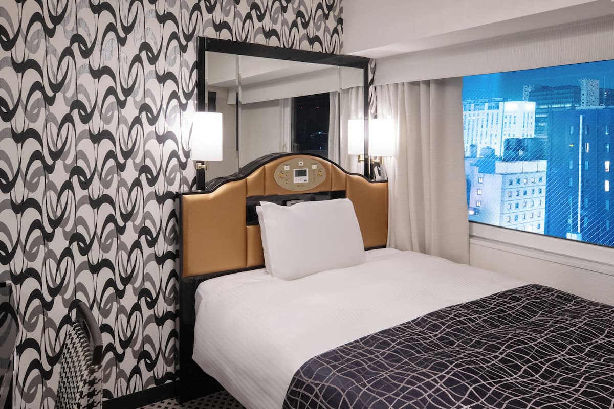 Down duvets, desk, laptop workspace, blackout curtains