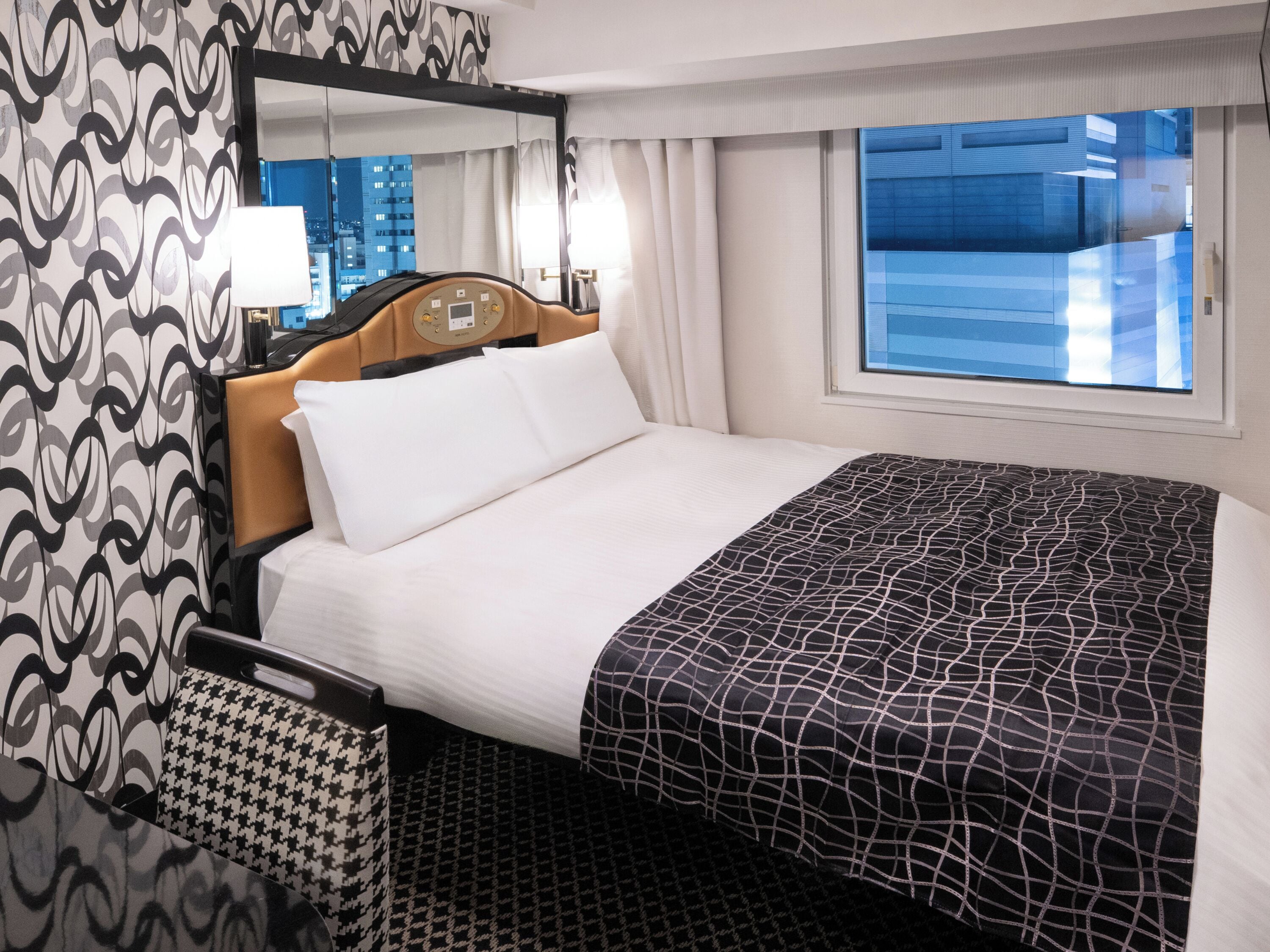 Down duvets, desk, laptop workspace, blackout curtains