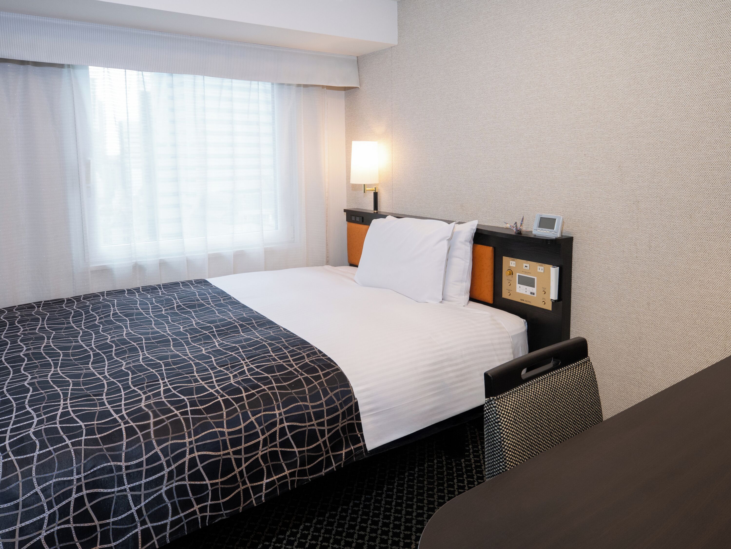 Down duvets, desk, laptop workspace, blackout curtains