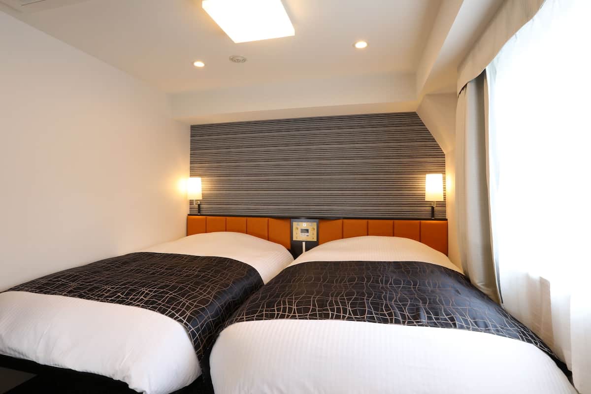 Chambre avec lits jumeaux, 2 lits une place, non-fumeurs | Couette en duvet d'oie, bureau