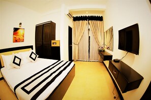 Deluxe tweepersoonskamer, 1 tweepersoonsbed, niet-roken, uitzicht op tuin | Luxe beddengoed, een kluis op de kamer, individueel gedecoreerd
